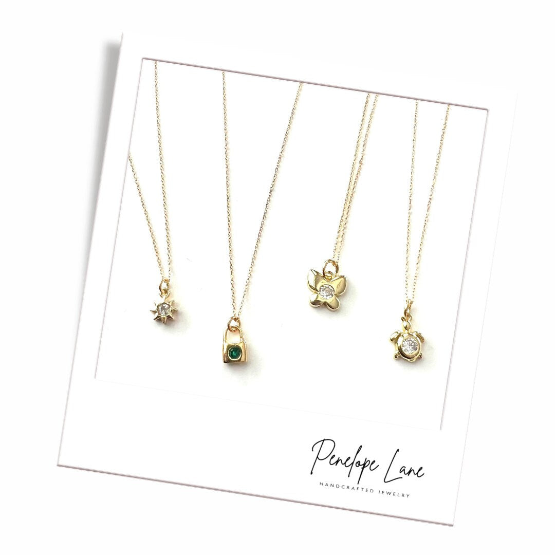 The Symbolic Splendor Lock, Turtle, Sun or Butterfly Necklaces