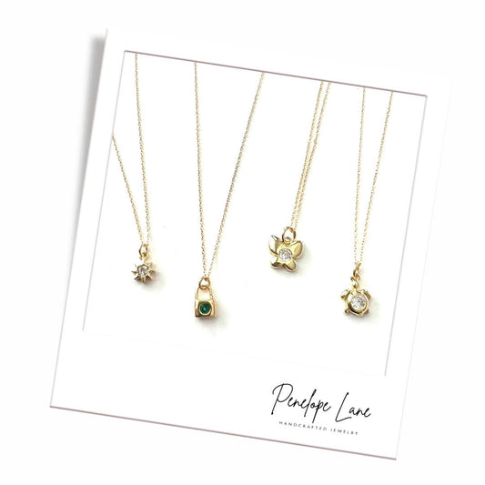 The Symbolic Splendor Lock, Turtle, Sun or Butterfly Necklaces